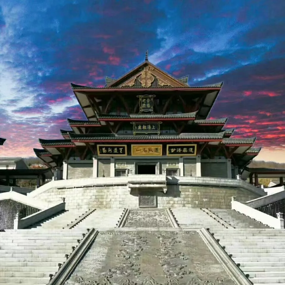 Temple architecture beneath an evening sky